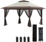 The gazebo set up in a garden with mesh netting for protection against insects.