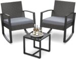 The sleek glass table included in the patio furniture set, offering functionality and elegance for any outdoor setting.