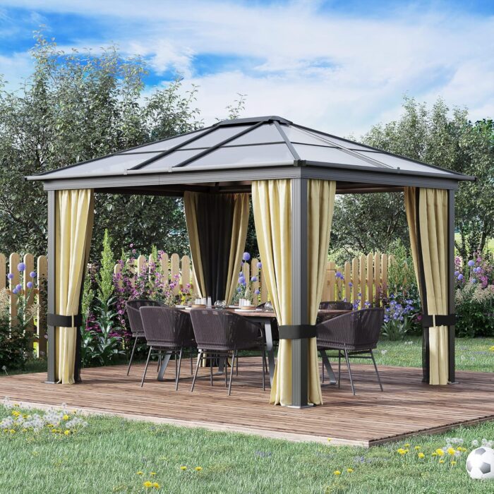 The hardtop gazebo set up outdoors with polycarbonate roof and mesh netting.